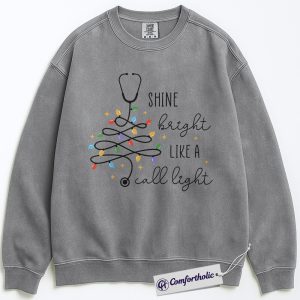 Alternative view of Shine Bright Like a Call Light Sweatshirt, Funny Nurse Christmas Pullover, Cute Medical Worker Graphic Sweatshirt, Christmas Gift for Nurses and Healthcare Professionals, Christmas Comfort Colors Sweatshirt