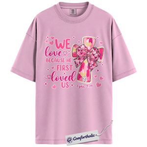We Love Because He First Loved Us Shirt, Pink Cross Bow Christian Graphic Tee, 1 John 4:19 Bible Verse T-Shirt, Valentine’s Day Gift for Christian Women, Comfort Colors Shirt