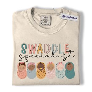 Swaddle Specialist Shirt, Cute NICU Nurse Graphic Tee, Newborn Baby Care T-Shirt, Nurse Appreciation Gift, Comfort Colors Shirt